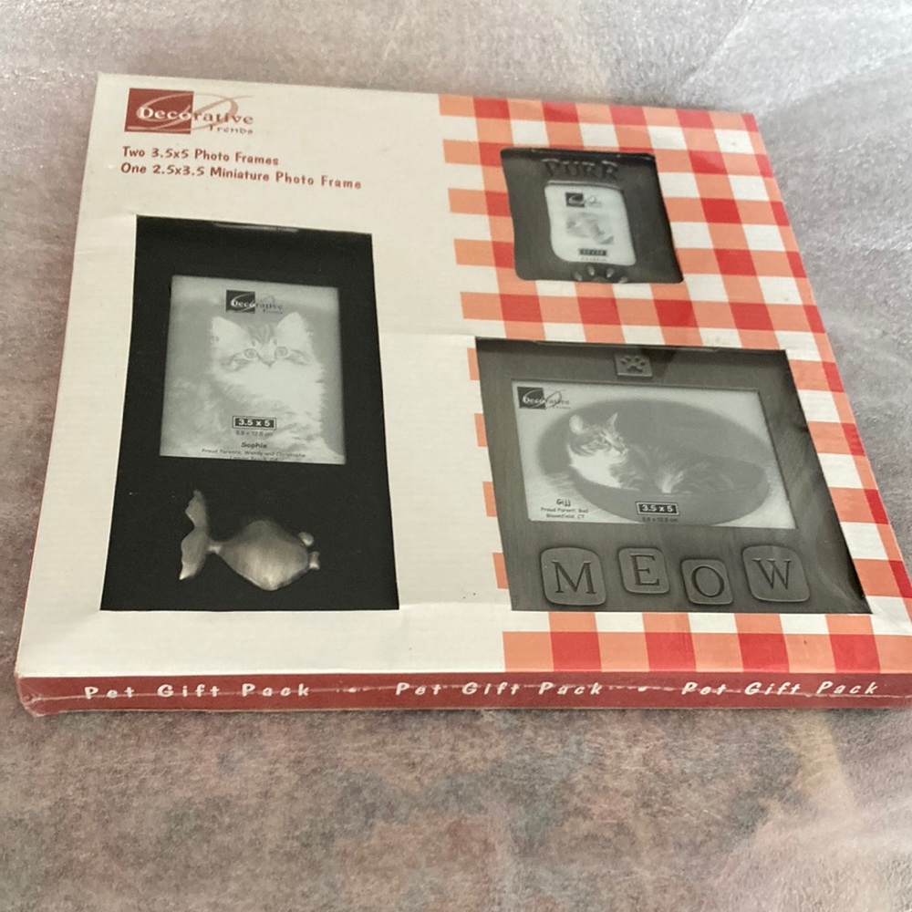 Two 3.5 by 5 photo frames and one 2.5 by 3.5 miniature photo frame